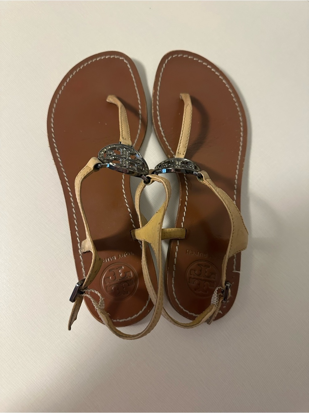 Tory Burch Tan Leather T-Strap Sandals with Silver Gem Medallion